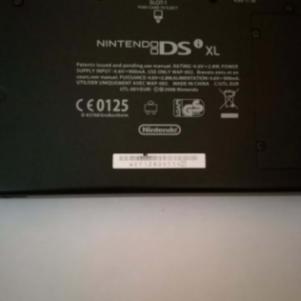 NINTENDO DSI XL + 2 παιχνίδια (fifa 11 , the lord of the rings -